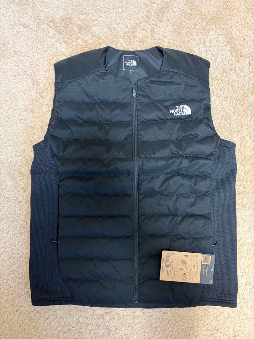 ノースフェイス　2024年レッドランベストレディースNYW82494 Lサイズ