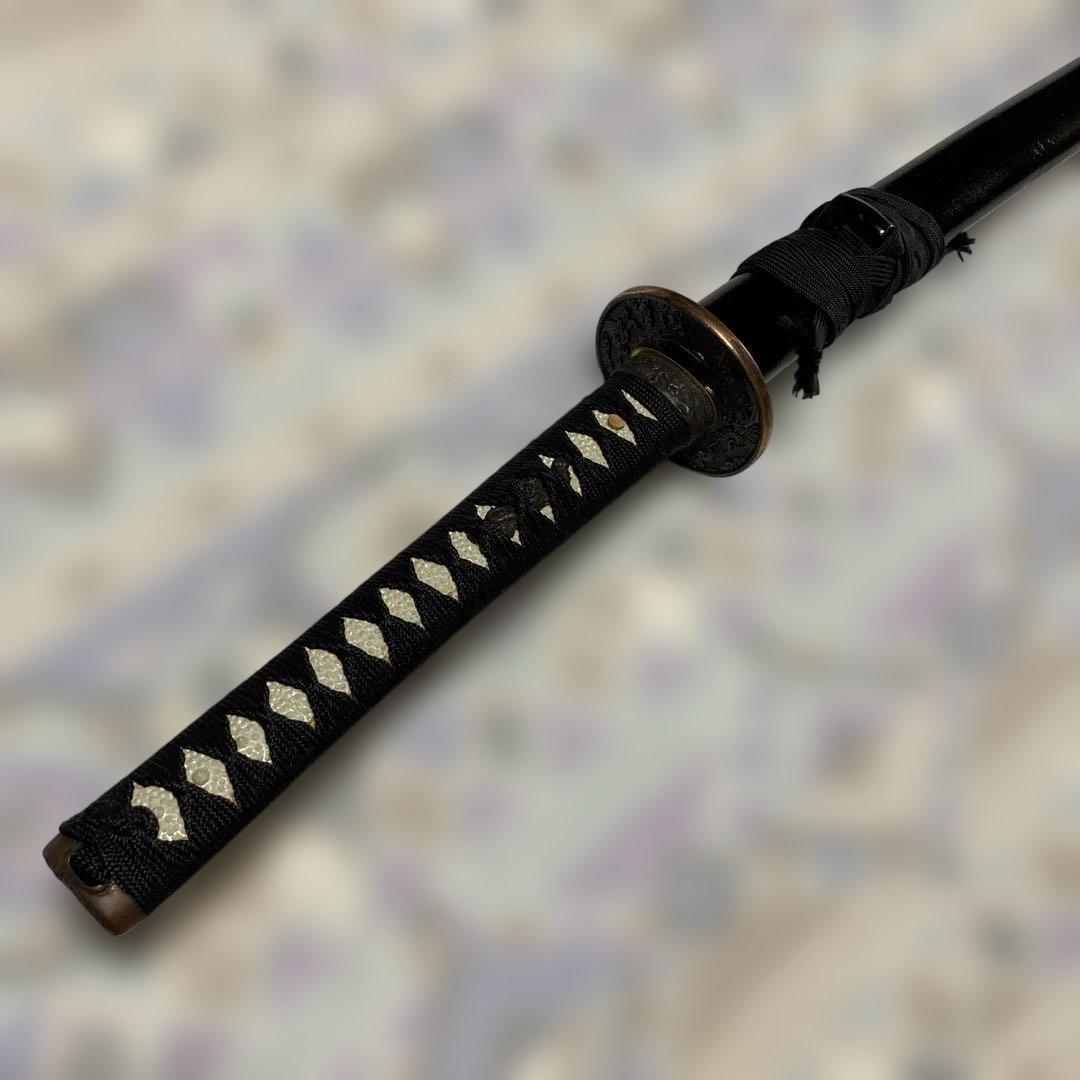 上級模造刀 黒柄 雲龍金縁楕円鍔